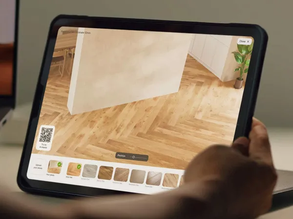 A tablet showing a room with its floor replaced by herringbone parquet
