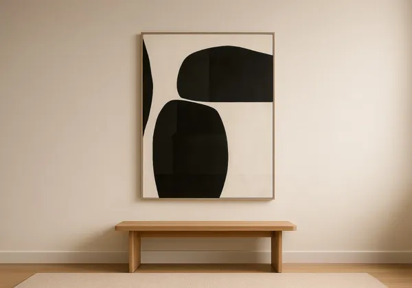 A large abstract framed canvas hung above a wooden bench